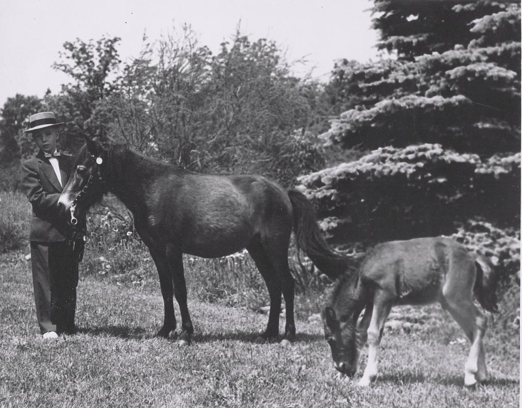 Baker with his first pony, Lady. (Courtesy of Janis Maine)